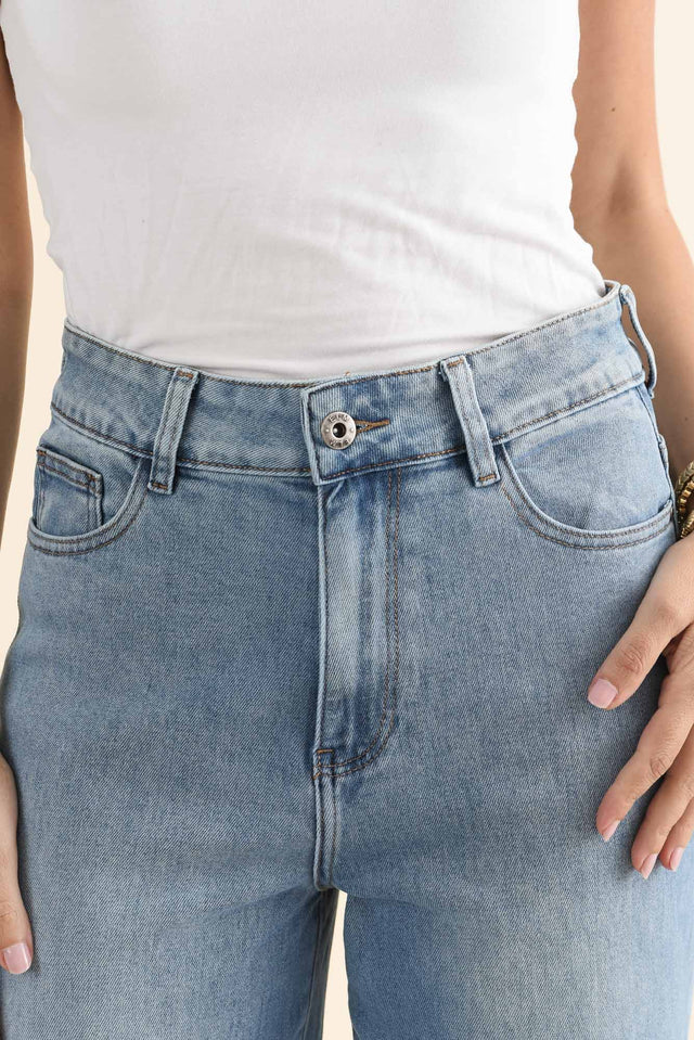 Deb Mid Blue Denim Wide Leg Jeans,brunette model,Close up of outfit,alt text|model:MJ image 5
