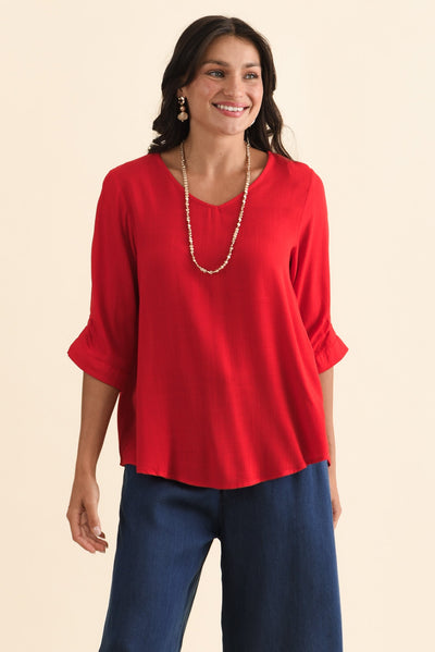 Gomez Red Button Top