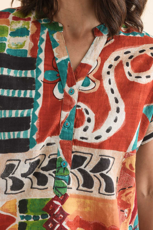 Melda Orange Tropical Organic Cotton Top,Detail,Brunette model,alt text|model:Cara image 5
