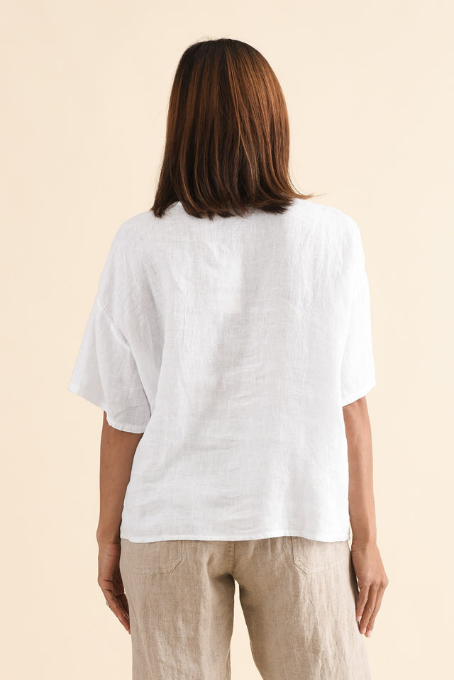 Odia White Abstract Linen Embroidered Top,Back,Brunette model,alt text|model:Cara image 4