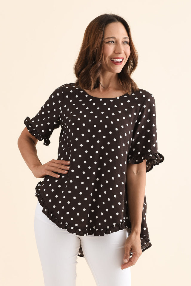Quincy Brown Spot Ruffle Top,Front,Brunette model,alt text|model:Cara image 1