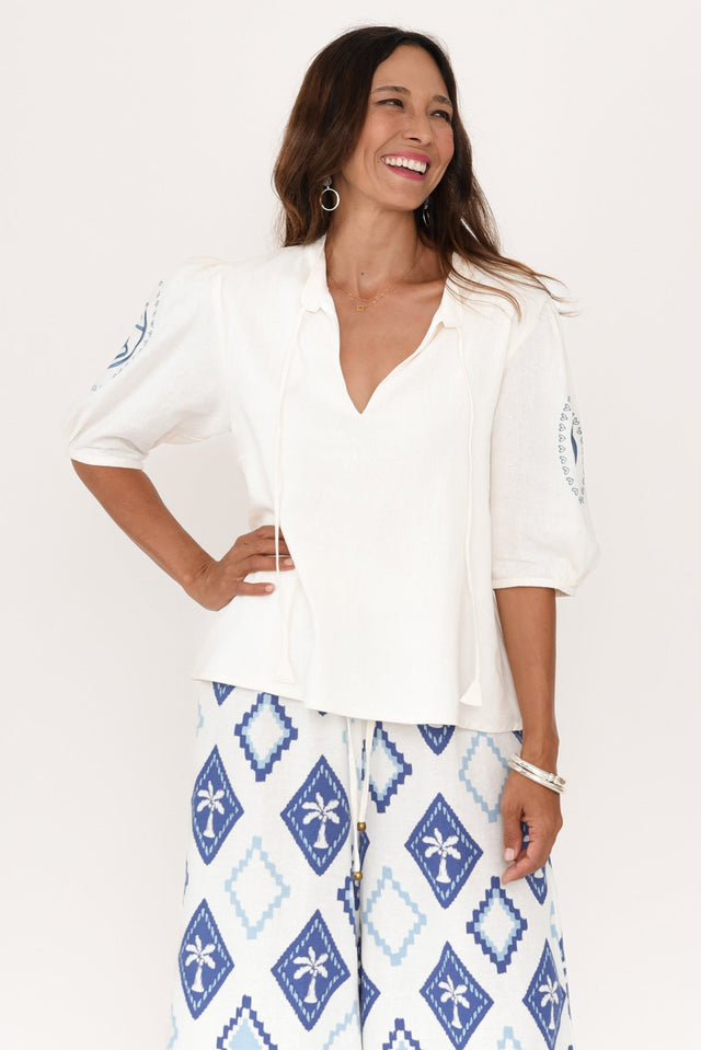 Steph Cream Seashell Embroidered Linen Top,Brunette model,alt text|model:Cara