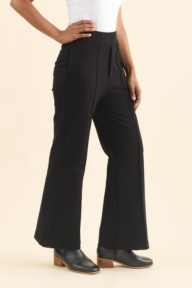 Themis Black Ponte Flare Pants,Brunette model,alt text|model:Cara image 4