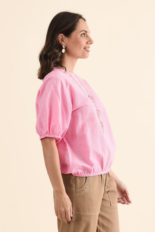 Astrid Pink Cotton Textured Top,brunette model,Side of Outfit,alt text|model:MJ image 3