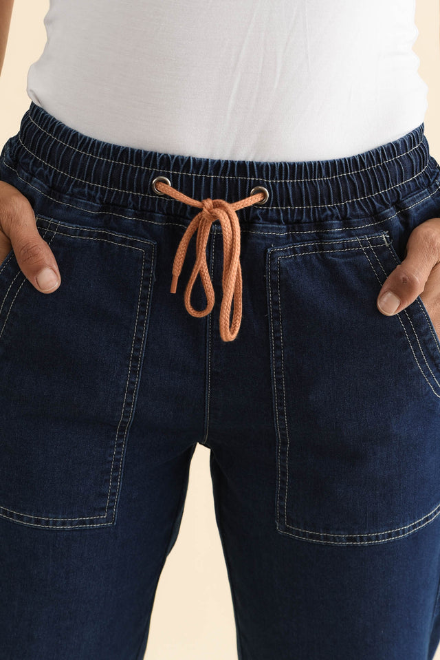 Orbe Indigo Denim Drawstring Jeans,Brunette model,alt text|model:Cara image 7