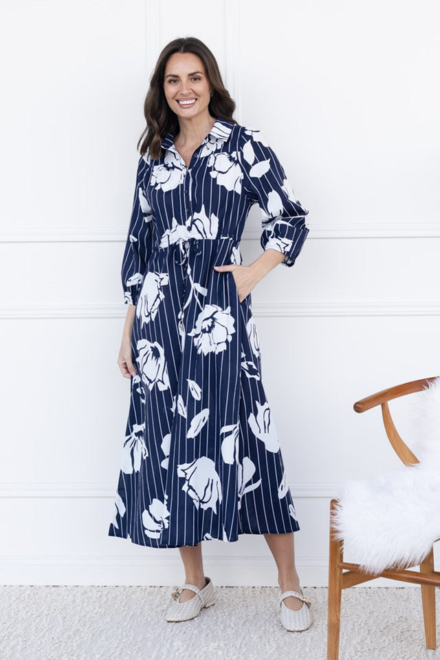 Keaton Navy Floral Stripe Tie Dress,brunette model,Front of Outfit,Lifestyle